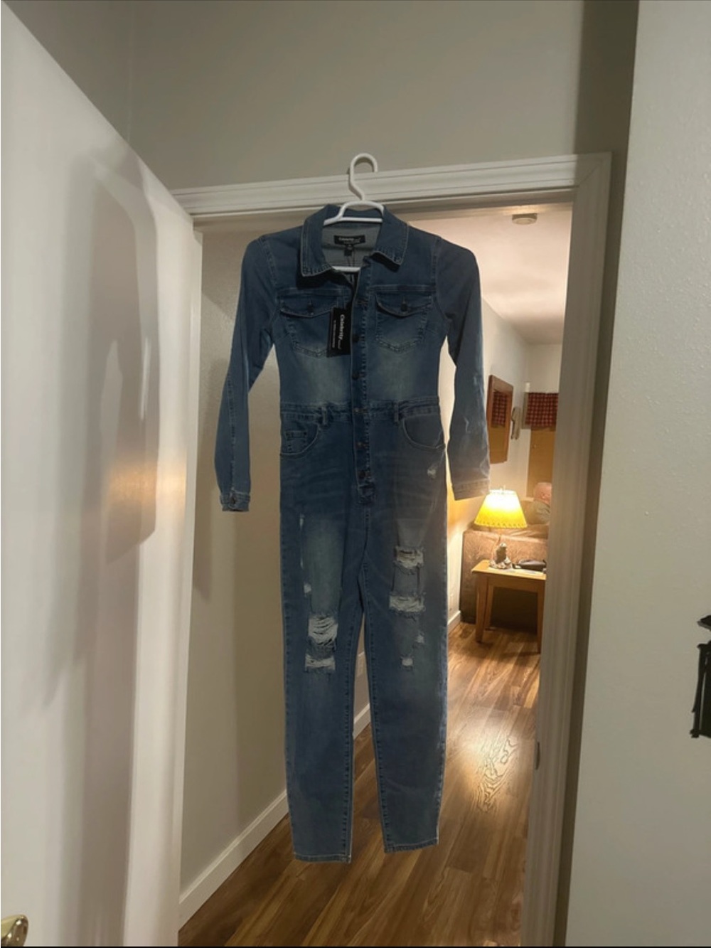 Celebrity Pink Distressed Blue Denim Jumpsuit